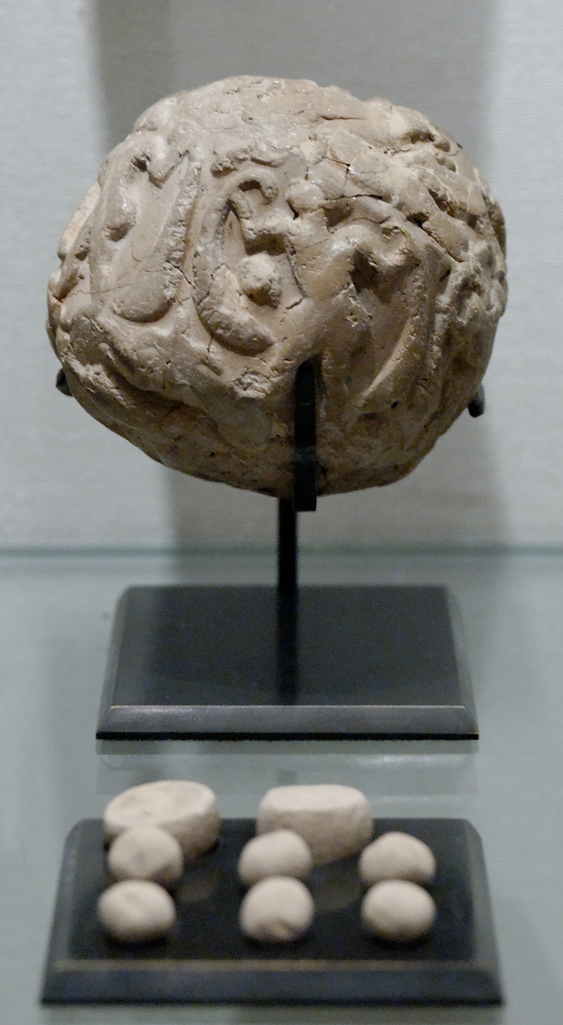 Fig. 6. An example of what Besserat called a “globular envelope” with
          tokens, Uruk period, Susa (Louvre Museum).
